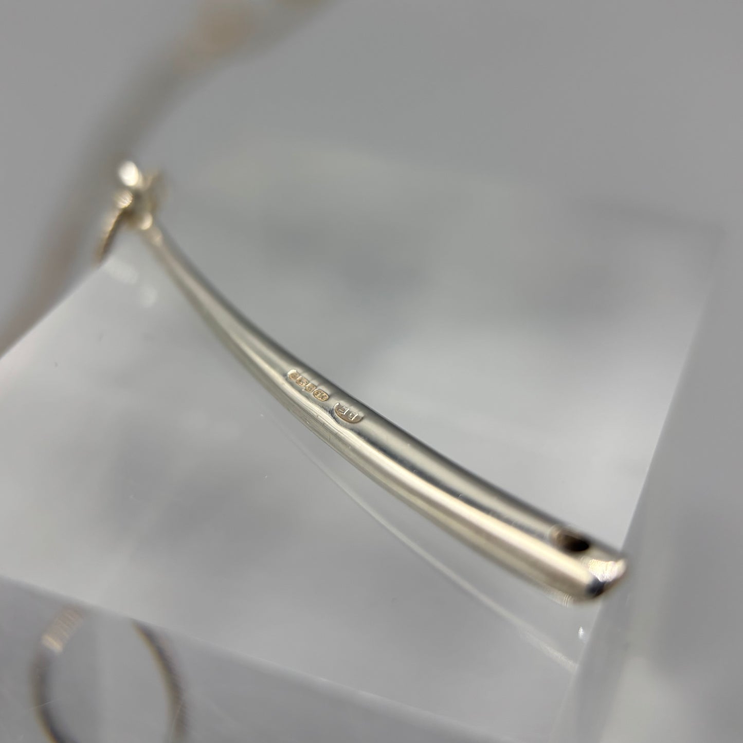 Paul Finch - Pendant: Long curved solid silver/blue topaz & solid 18ct Yellow Gold bead