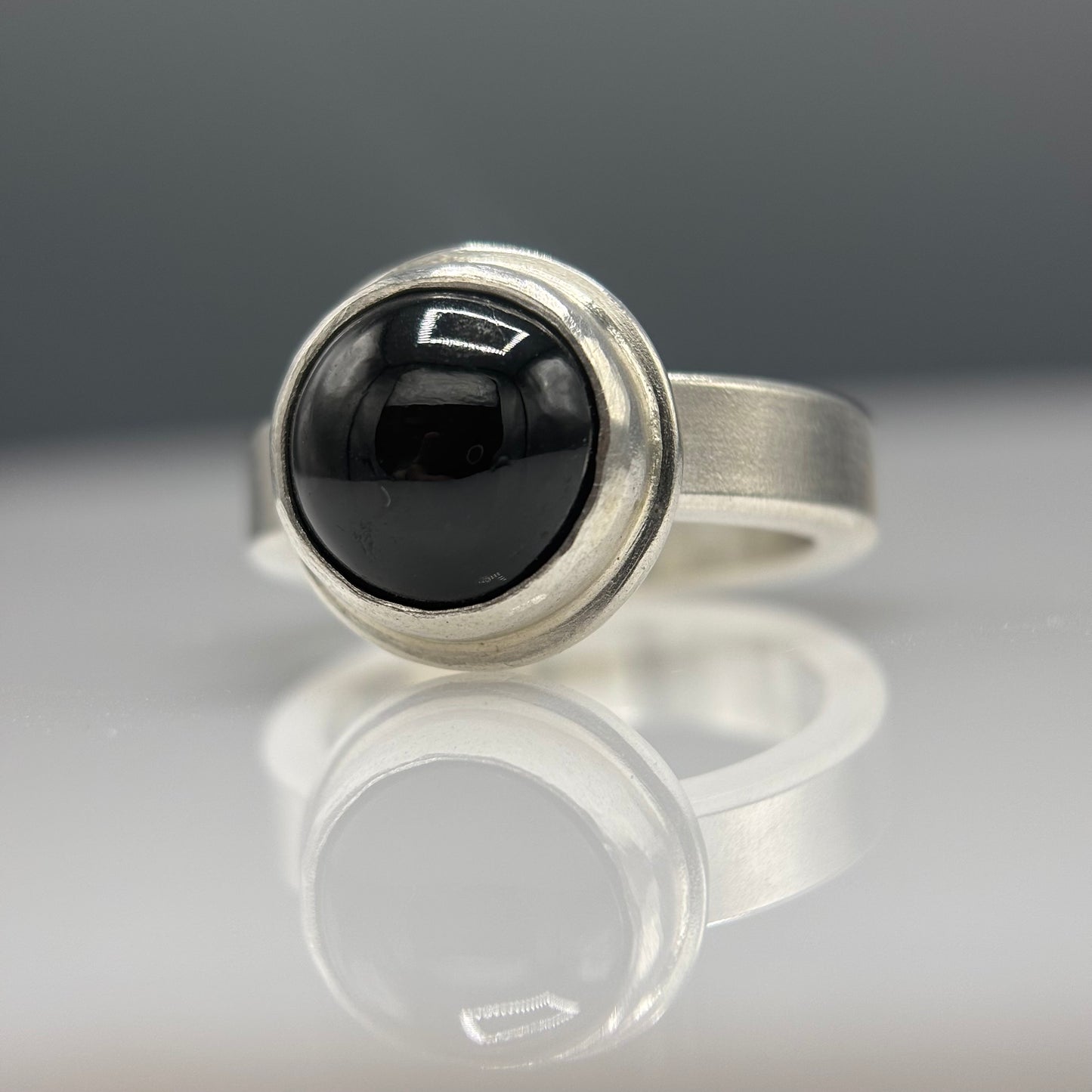 Anthony Feiler – Ring: Black Diopside in Stepped Silver Bezel