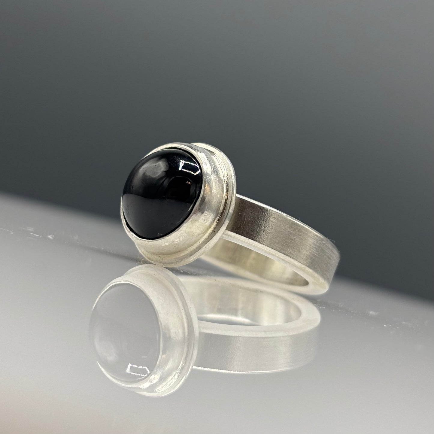 Anthony Feiler – Ring: Black Diopside in Stepped Silver Bezel