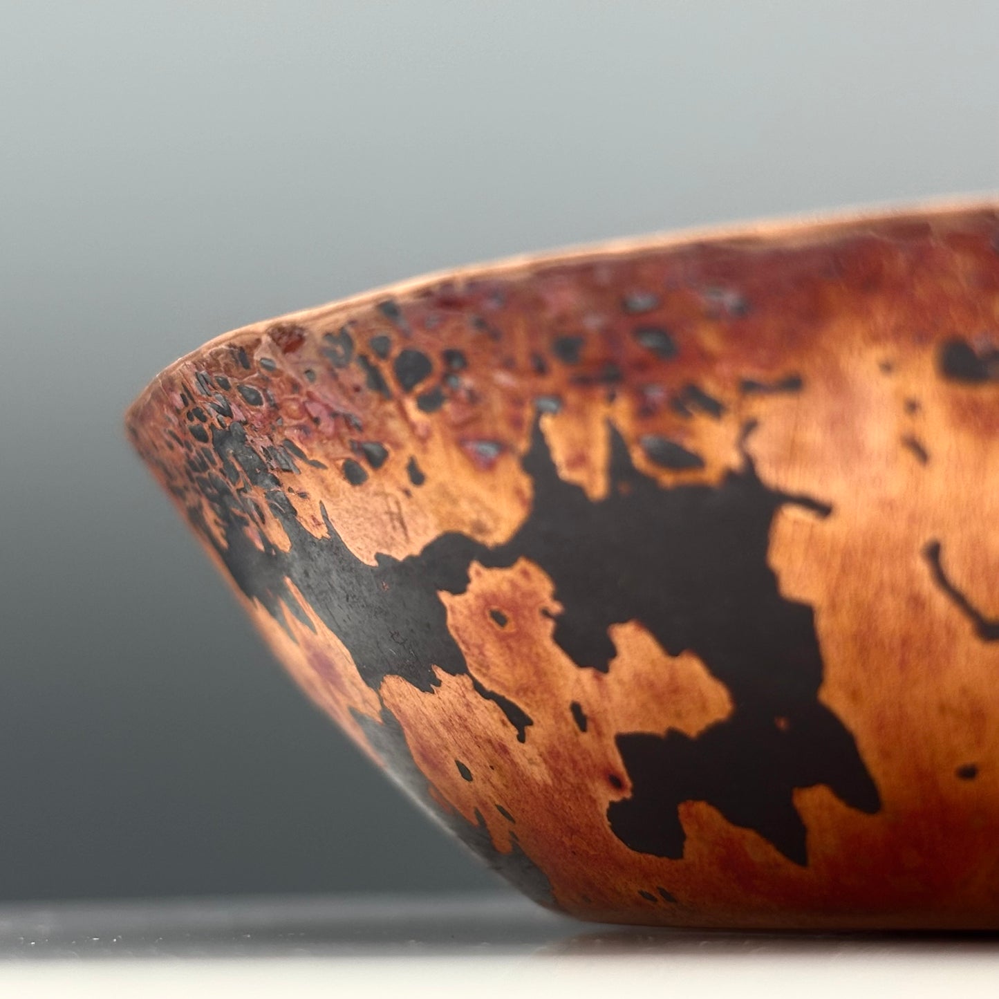 Cruan Marino Small Enamelled Copper Bowl Soft White II, close-up of textured copper exterior and rim