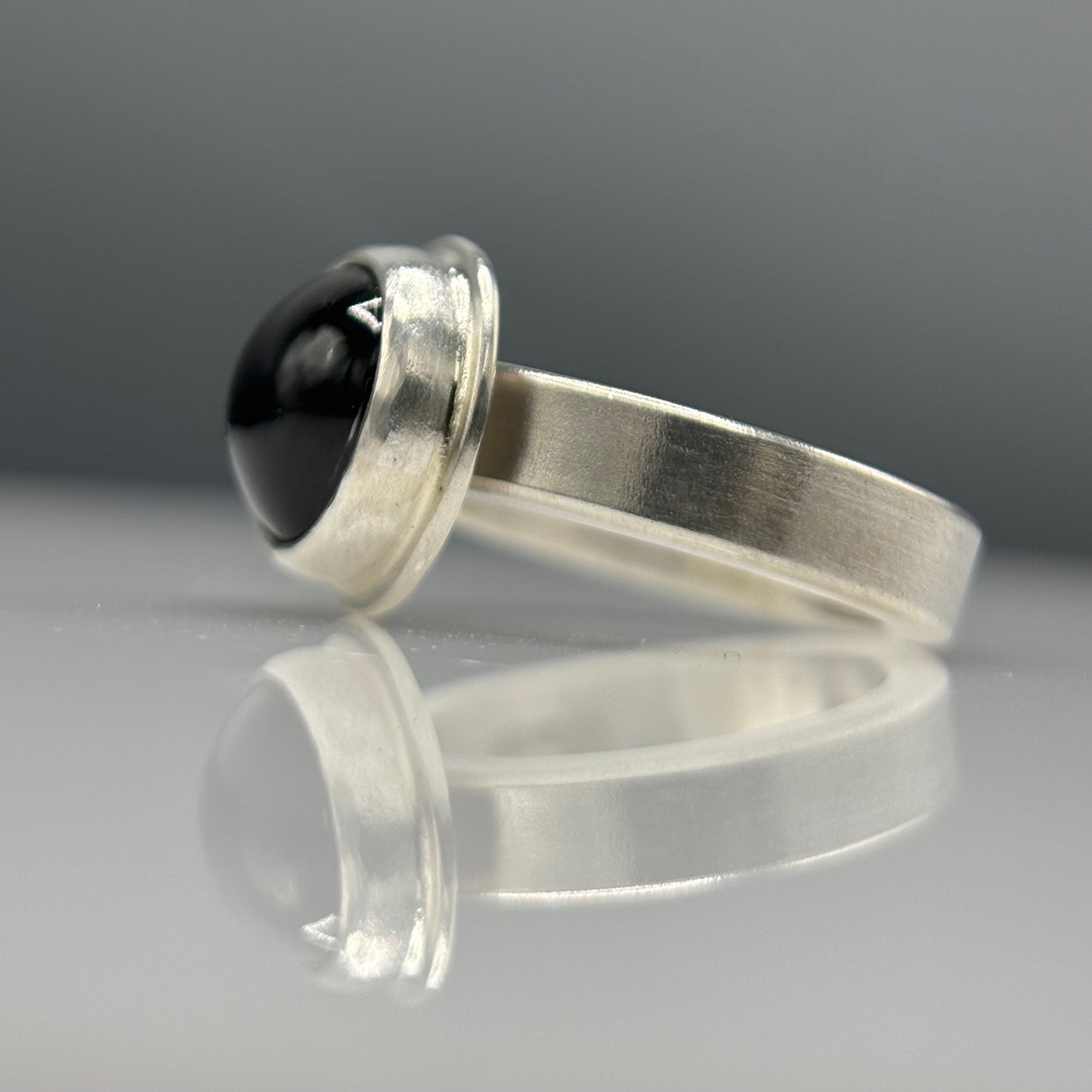 Anthony Feiler – Ring: Black Diopside in Stepped Silver Bezel