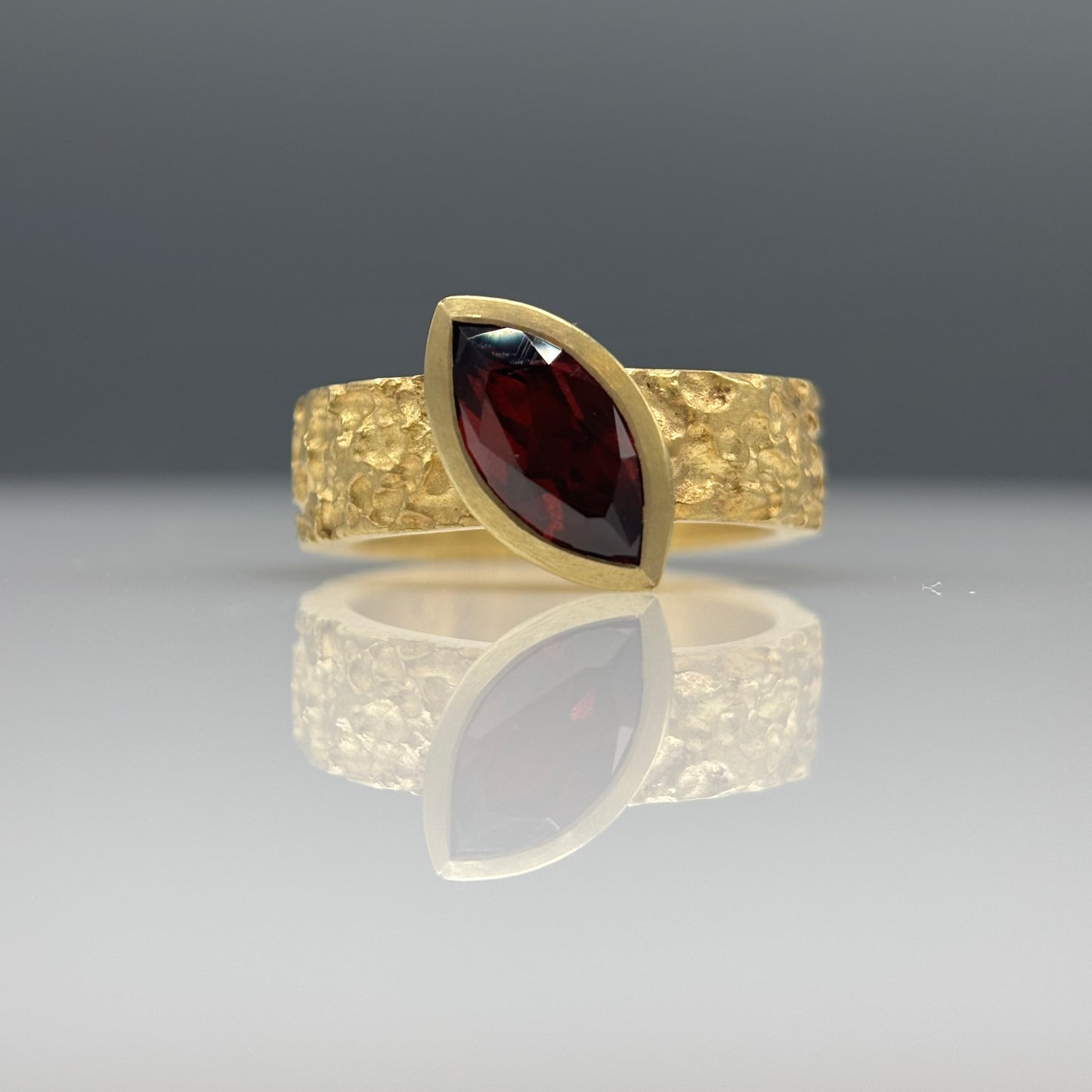 Susi Hines 18ct gold plated etched silver ring with marquis garnet