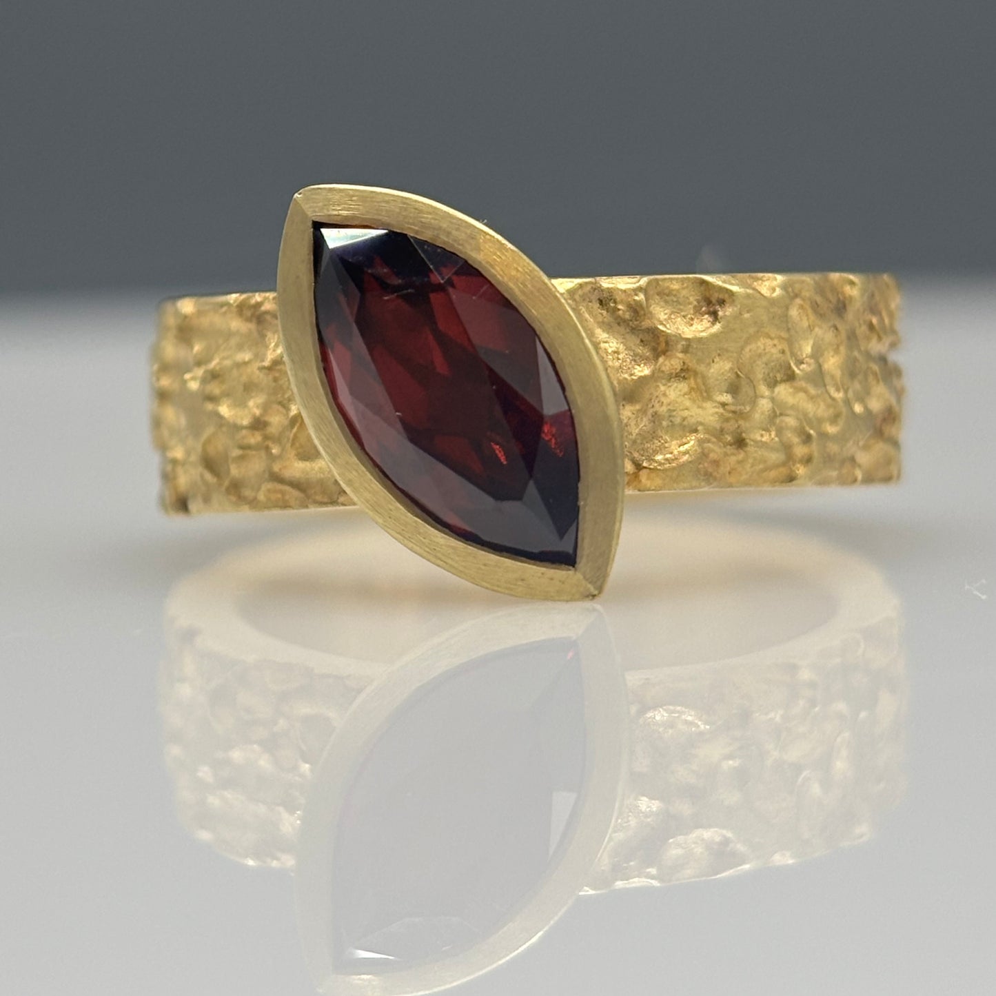 Susi Hines – 18ct Gold Plated Etched Silver Ring with Marquis Garnet