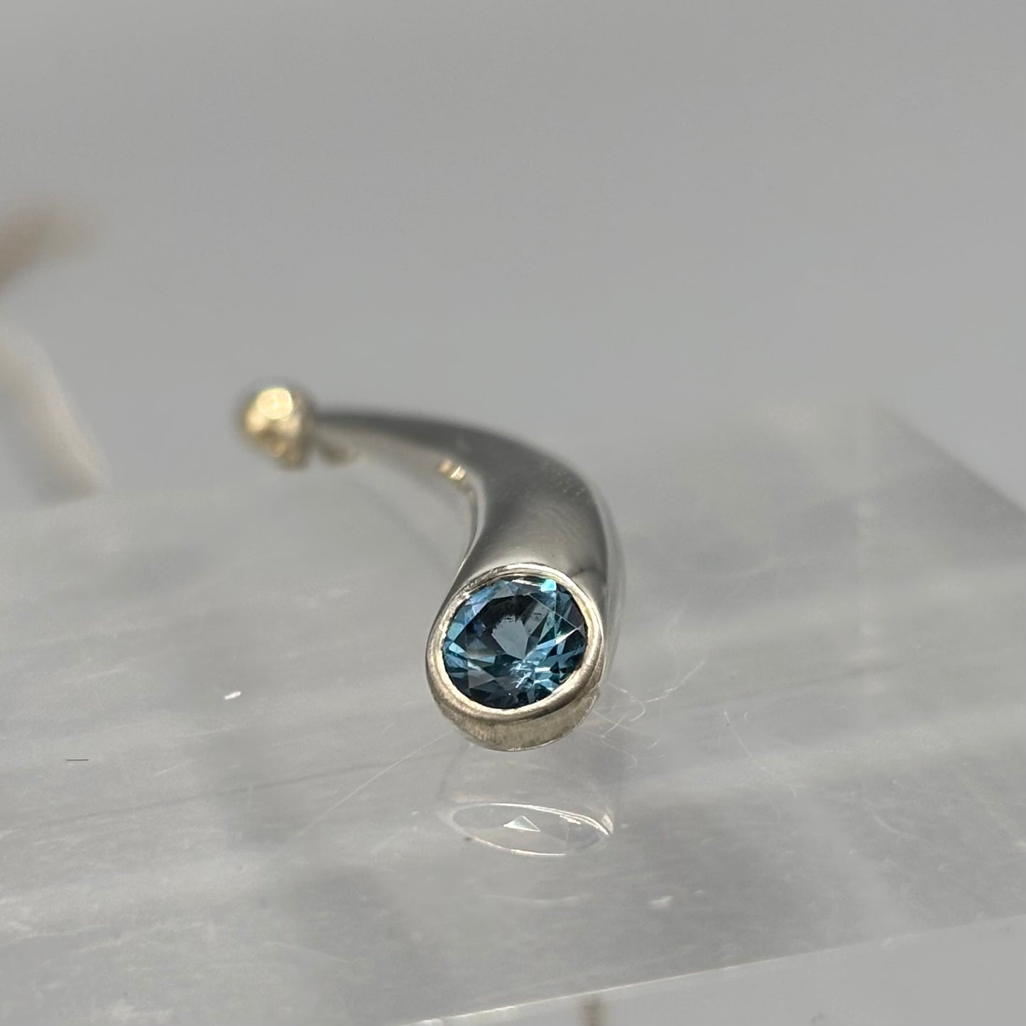 Paul Finch - Pendant: Short curved solid silver/blue topaz/solid 18ct Yellow Gold Bead