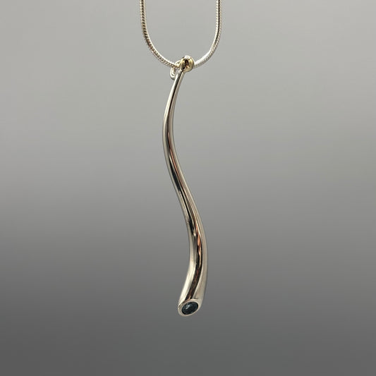 Paul Finch - Pendant: Curving solid silver with blue topaz & solid 18ct Yellow Gold bead